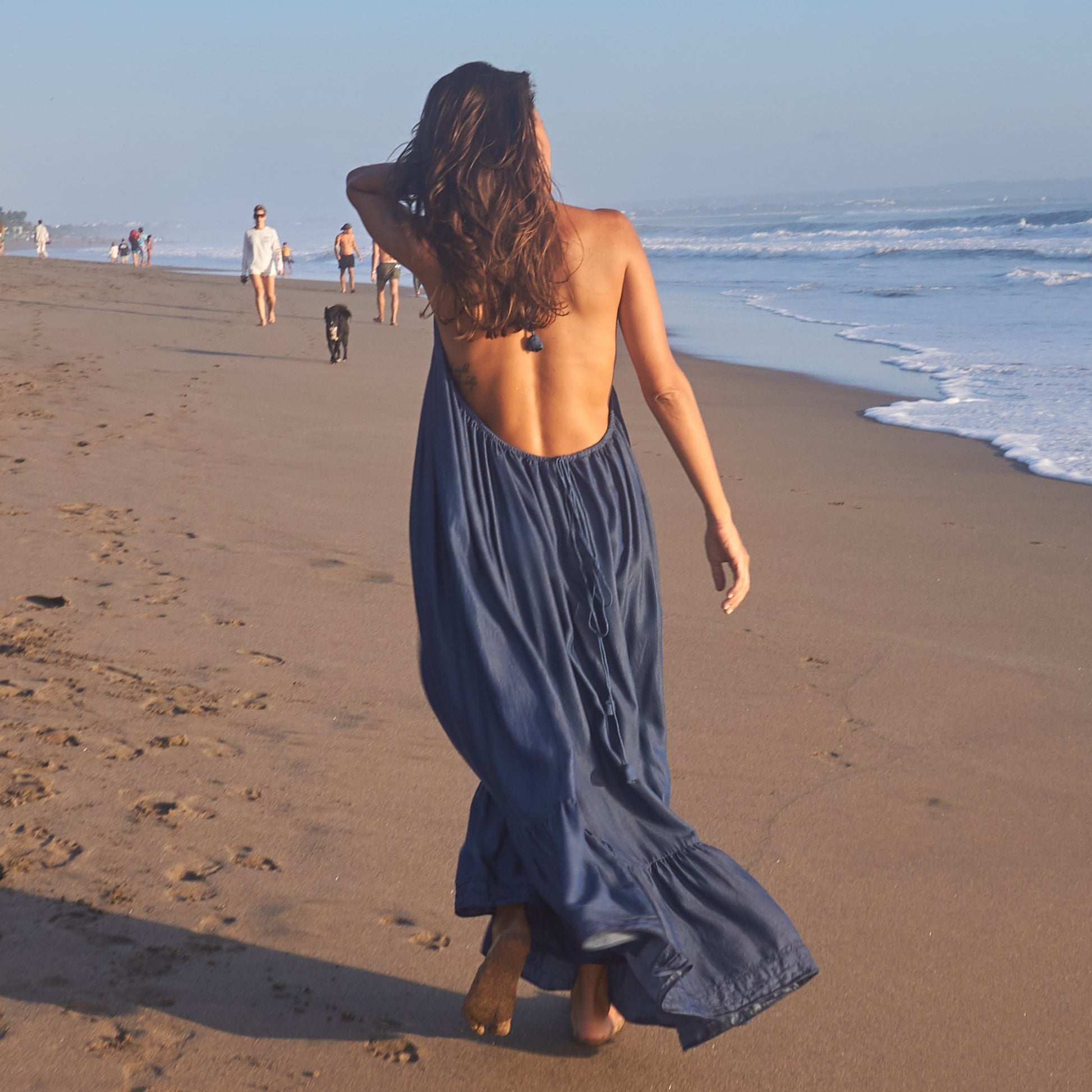 LONG BACKLESS RUFFLED DRESS - Tencel Denim | Blue LONG BACKLESS RUFFLED DRESS - Tencel Denim | Blue